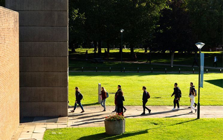 Students walking to lectures and seminars in the Arts buildings