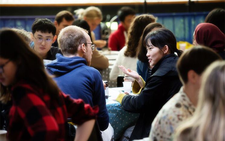 Students chatting at a University Buddy Scheme launch event
