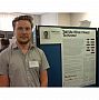 Matti Lyra with his poster at the 2013 Postgraduate Poster Presentation