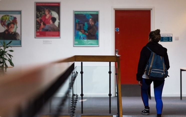 student going up the stairs in Pevensey 1