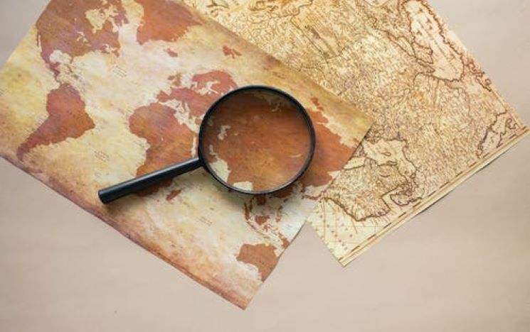magnifying glass over a map