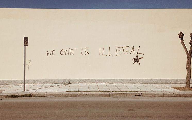 Graffiti on a wall in Kos, Greece, saying "NO ONE IS ILLEGAL"