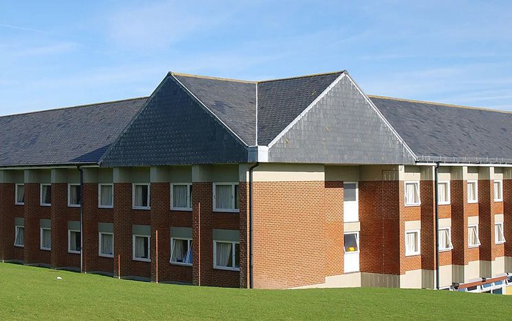 The exterior of Norwich House, a block of student accommodation on campus