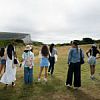 Summer School students look down the coast from Cuckmere Haven