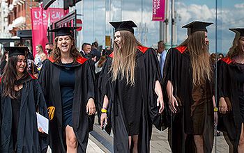 Students outside the Brighton Centre graduation venue