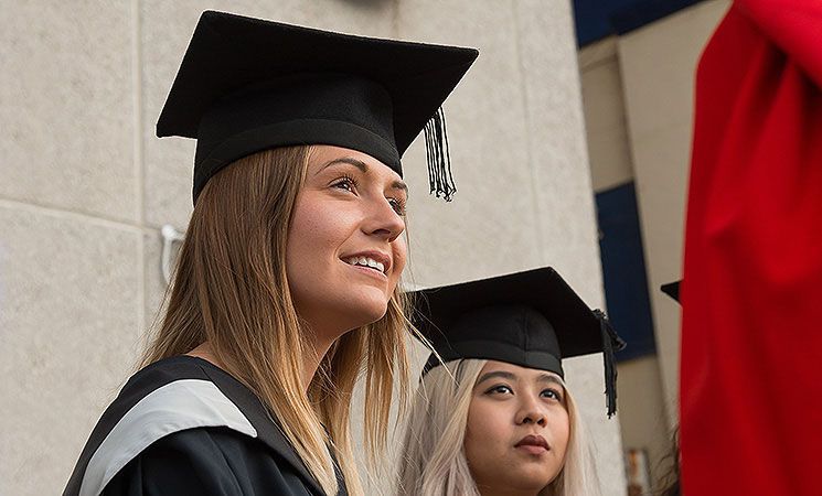 Students outside the Brighton Centre graduation venue