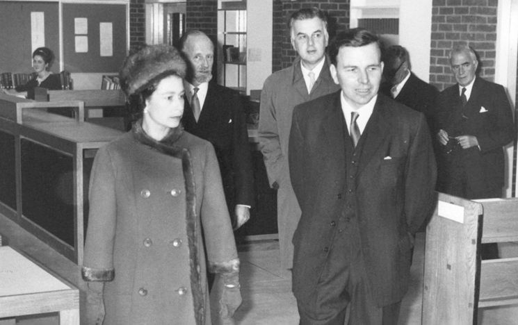 The Queen, Basil Spence, and Dennis Cox, walking around the Library shortly after it opened in 1964