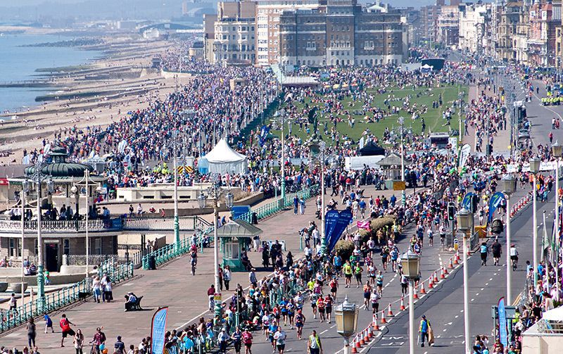 Runners going past Hove Lawns