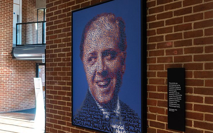 A portrait of a young Richard Attenborough, made using creative typography and donors signatures, hangs in the red-brick entrance hall of the Attenborough Centre for Creative Arts.