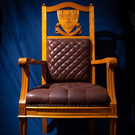 The ceremonial chair, sat in by the Chancellor at graduation ceremonies, made from Newfoundland birch and sealskin.