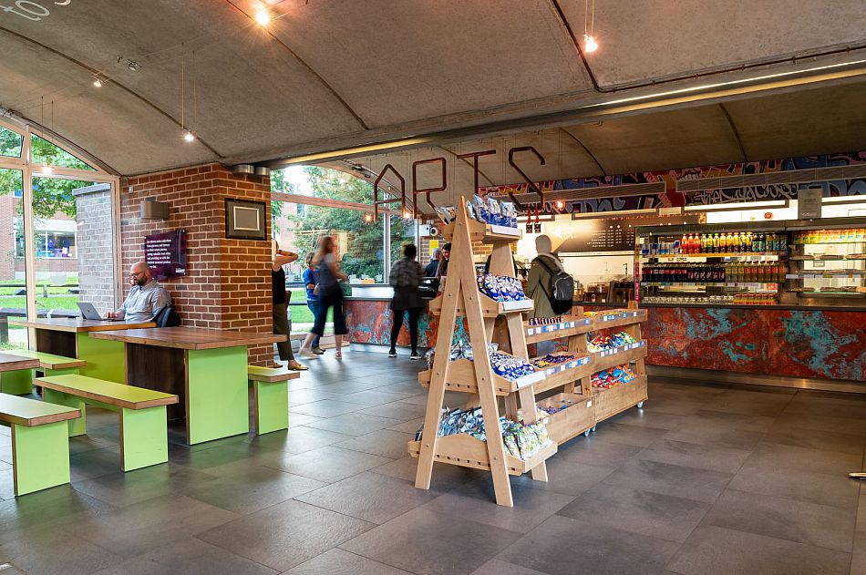 Interior of the Arts Piazza showing the seats and shelves