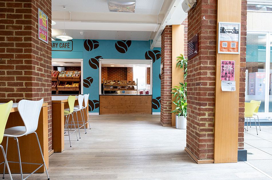 The interior of the library cafe showing the the counter and parts of the seating area.