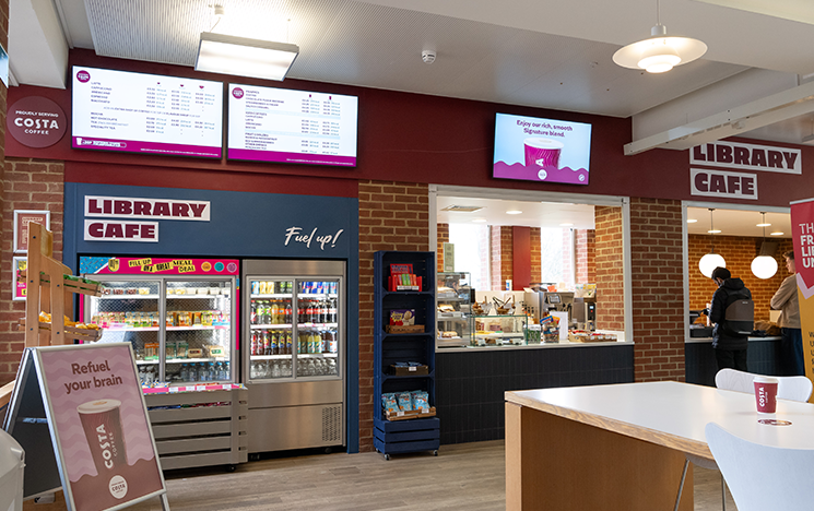 The interior of the library cafe showing the counter and part of the seating area.