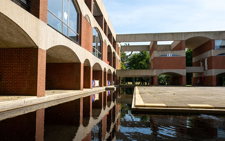 Falmer House with the moat in the foreground.