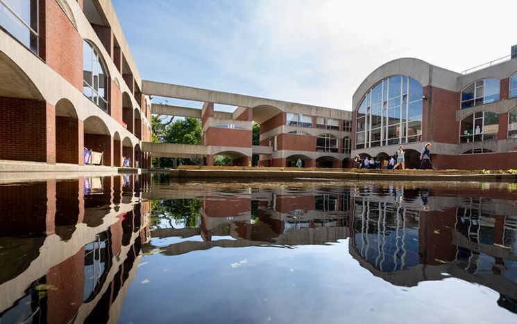 Moat and red brick buildings
