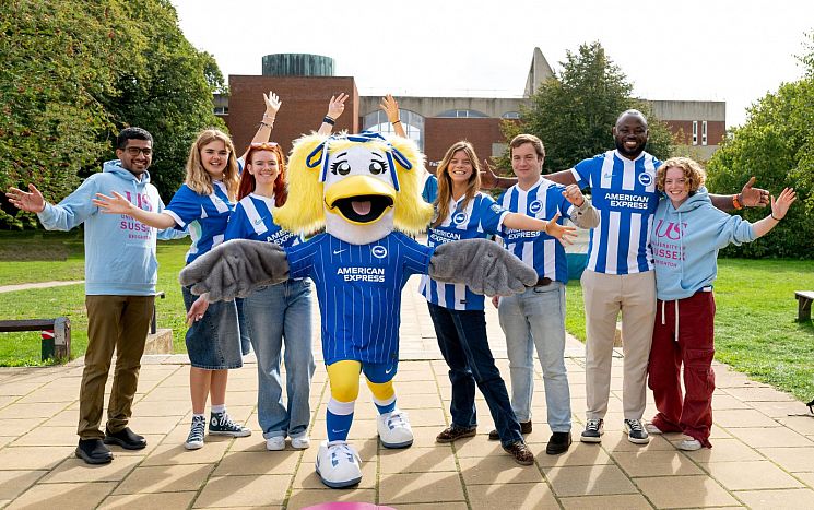 Sally Seagull, the Brighton & Hove Albion Football Club's mascot posing with our students.