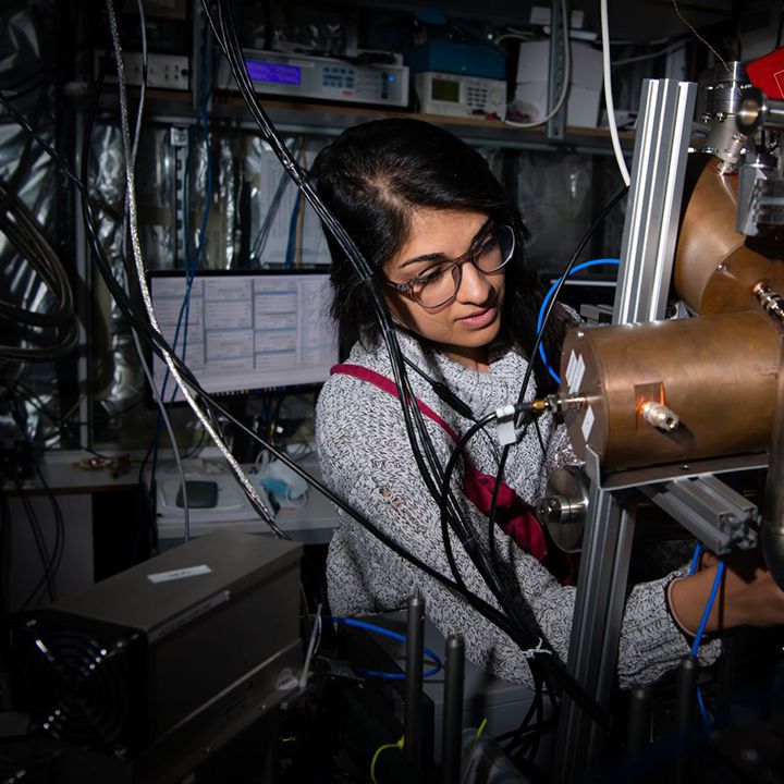 Woman working on machine