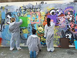 Sussex Law students create art work and paint freely on walls at Sinna One