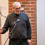 Mike Tristram, Chair of Sussex Traditions, stood talking at a microphone