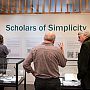 Attendees enjoying the Scholars of Simplicity exhibition