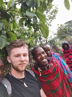 MPhys Astrophysics student Andrew Bowell with Maasai Farmers in Kenya