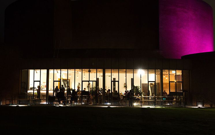 Building at night with lit up window