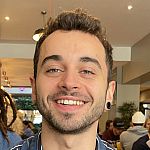 Portrait photograph of Dominic West