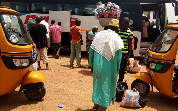 Passengers preparing to board a coach in Bawku, Ghana