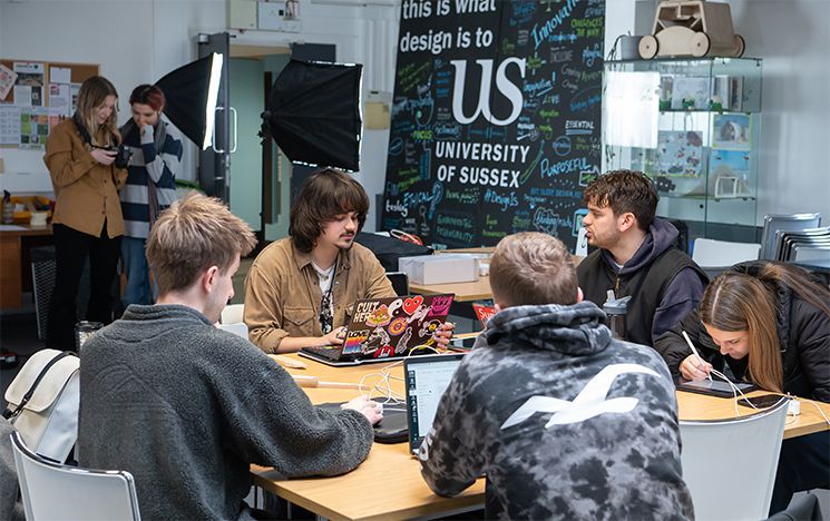 Students working on computers in the design studio