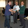 Andrew Robertson receives his prize certificate from Dr. Bill Keller and Prof. Peter Cheng.