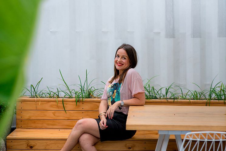 Abi Stephenson sat on bench