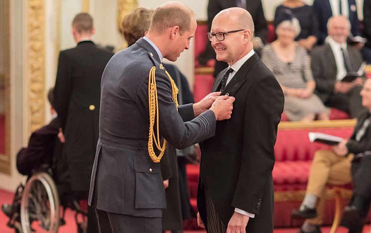Marcus Hayes receiving MBE
