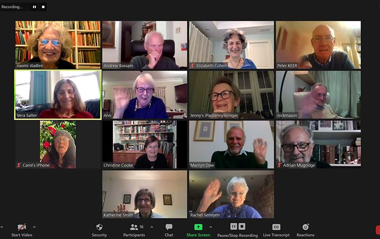 Screenshot of 1961 alumni in their Zoom reunion, waving at the camera