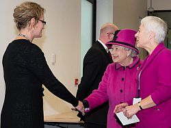 Her Majesty greets Dr Fiona Courage, Director of the Mass Observation Archive, with Sussex County Archivist Elizabeth Hughes