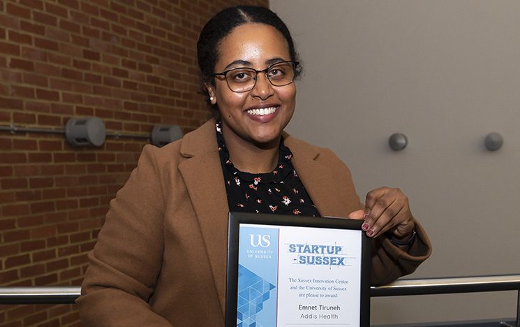 Winner of StartUp Sussex 2023 Emnet Tiruneh holds her prize certificate