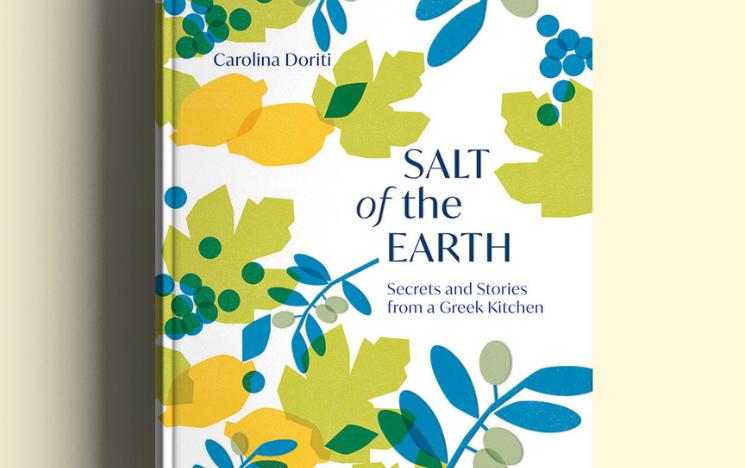 The cover art for Carolina's book, Salt of the Earth: Secrets and Stories From a Greek Kitchen, which includes illustrations of lemons, olive branches and olives.