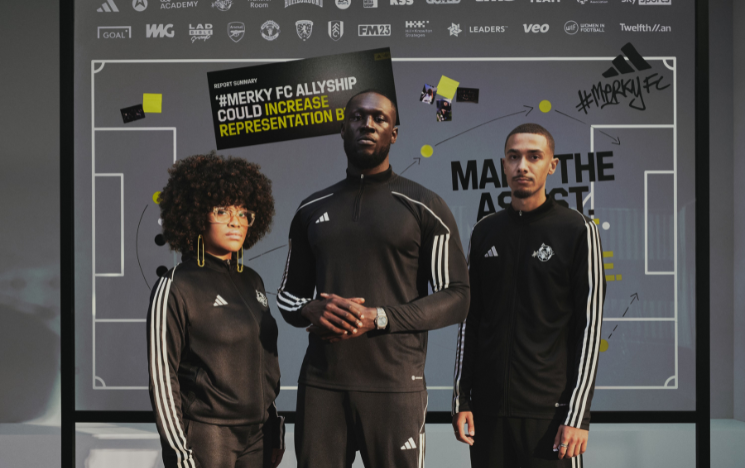 Marley Ahmed stood posing with Stormzy and another member of the #MerkyFC programme between Adidas and Stormzy.