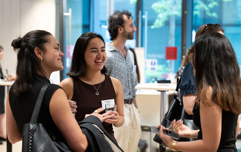 Sussex alumni stood networking with one another during an event for recent graduates in London