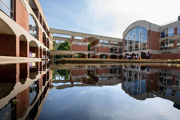 Picture of Falmer House Building with moat in foreground
