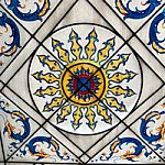 Ornate geometric pattern with dragons on ceiling