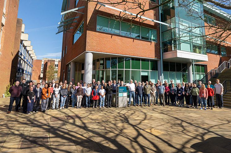 Genome All group picture in front of the building