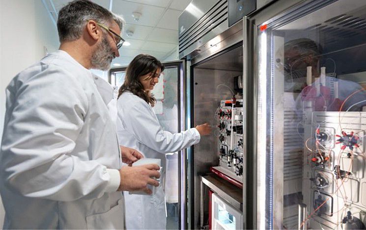 Staff member with PhD student