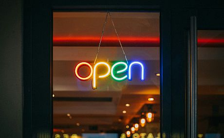 Neon sign saying Open