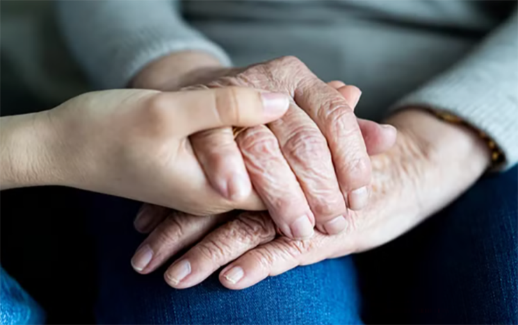 Holding hands, elderly people