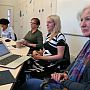 Professor Miriam David with colleagues at a roundtable discussion