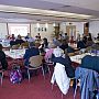 Conference delegates listen to Conversation Two