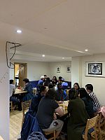 people at a table playing board games