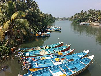 Fishing boats docked in the safety of a local lagoon in Anchuthengu village in Thiruvananthapuram