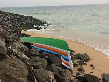 A fishing boat crashed against the seawall near Anchuthengu, a risk the local fishers face during the rough-sea monsoon season