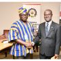 Prof George Gyan Baffour (right) shaking hands with another conference participant (left) in the UN conference room during the High-Level Political Forum side event posing for a picture